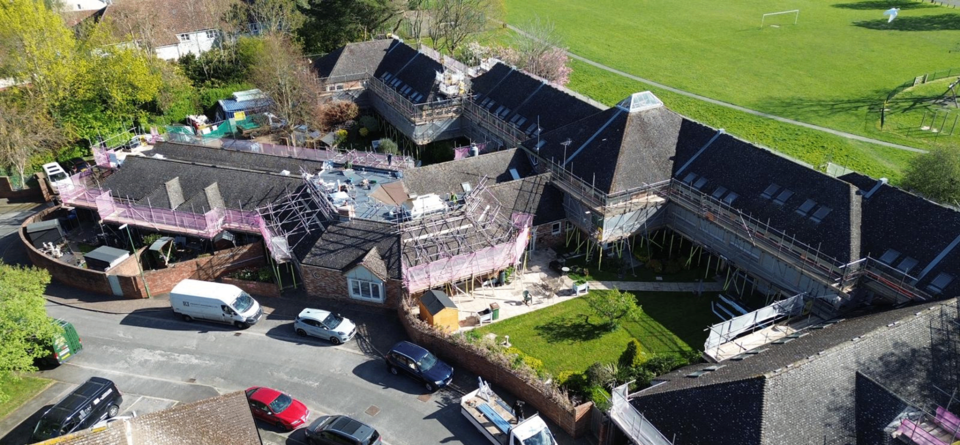Aerial view of Hordern House safe access scaffolding wrapping a heritage residential property in West Sussex